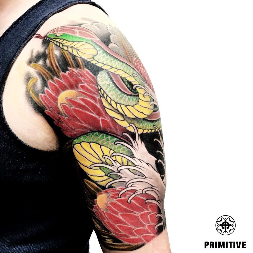 Japanese snake (hebi) half sleeve tattoo with red peonies and waves – Japanese tattoo studio in Perth, WA