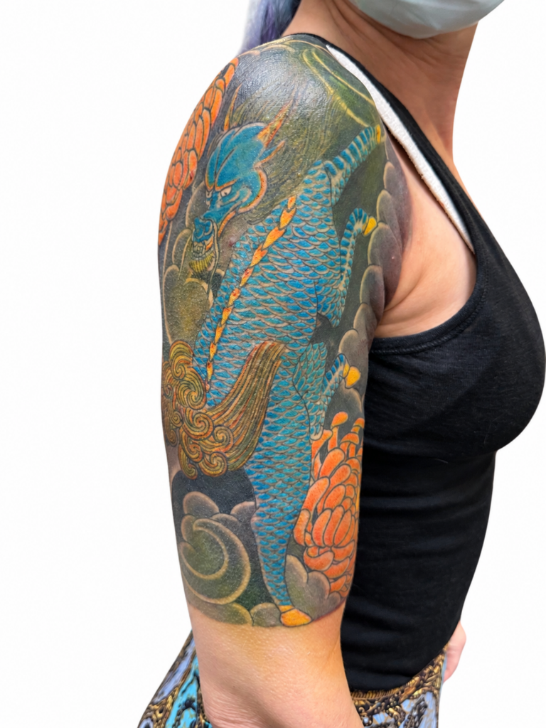 Japanese Kirin half sleeve tattoo in colour – Primitive Tattoo Perth